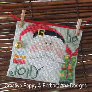using tiny miniature clothes pegs for hanging cross stitch ornaments